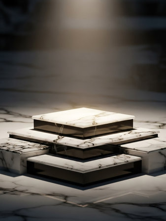 Stacked geometric pedestals featuring marble and dark accents, illuminated by a soft spotlight, creating a sophisticated display.の素材