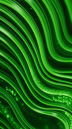 Vibrant green abstract wavy lines flow smoothly with subtle glowing particles creating a luminous and organic background texture.の素材