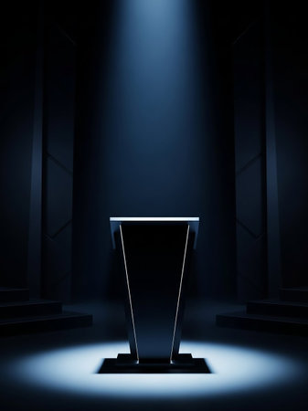 A modern, sleek black podium stands illuminated by a dramatic spotlight in a dark, minimalist room with steps on the sides.の素材