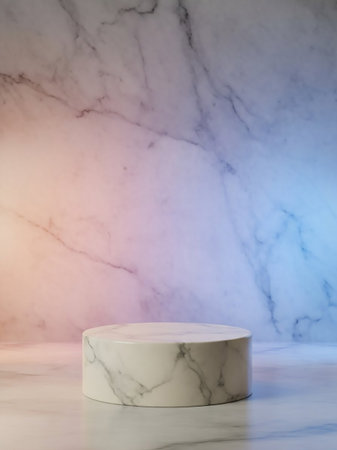 A white marble cylinder pedestal sits on a marble surface, illuminated by a soft pink and blue gradient light, creating a minimalist display.の素材