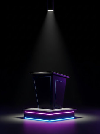 A sleek black podium stands on a platform with vibrant neon blue and purple lighting, illuminated by a single spotlight against a dark background.の素材