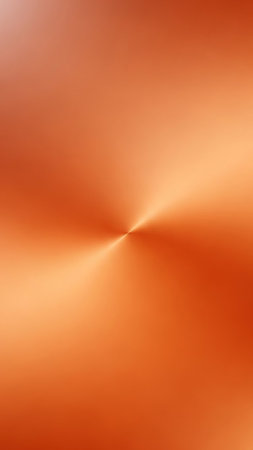 An abstract background featuring a radial gradient of warm orange and copper metallic texture, with a central bright point.の素材