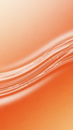 A soft and elegant abstract background featuring flowing wavy lines in shades of orange and cream, with subtle white highlights creating a gentle, fluid motion.の素材