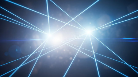 Abstract blue laser beams crisscross a dark background with bright light sources and lens flares, creating a futuristic and energetic visual.の素材