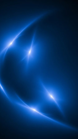 Abstract streaks of bright blue light and lens flares create a dynamic, energetic pattern against a dark background.の素材