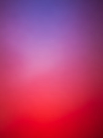 A soft, blurred gradient background transitioning from deep purple at the to vibrant red at the bottom, with a gentle pink hue in the middle.の素材
