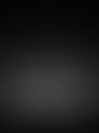 Black showing a completely black, dark, and featureless background with a subtle gradient of grey from bottom to overlaying text or keywords: black, background,...の素材