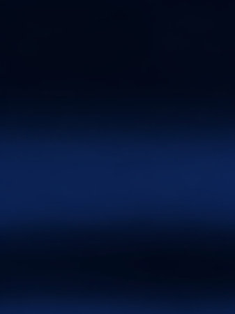 A smooth, dark blue gradient fills the frame, transitioning from a deep navy at the to a slightly lighter shade towards the bottom.の素材