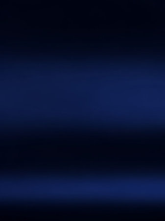 A smooth, dark gradient of deep navy blue fading into black, with a subtle soft glow at the bottom edge.の素材