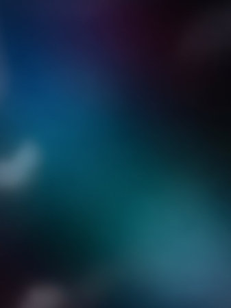 A soft focus abstract background with a gradient of deep teal, dark blue, and hints of purple, accented by subtle white and light blue bokeh.の素材