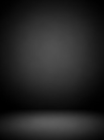 A dark gray studio background a soft spotlight in the center with a subtle floor shadow, creating an empty, neutral space.の素材