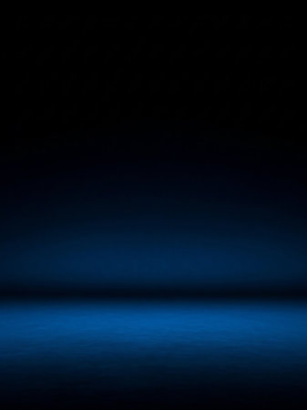 Studio showing dark blue gradient studio background with subtle light reflection on the floor and a faint horizon line creating a minimalist and atmospheric scene....の素材