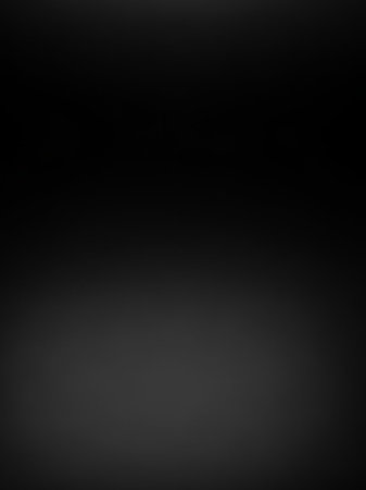 A smooth gradient transitions from dark gray at the to black at the bottom, with a soft, subtle light diffusion at the base.の素材