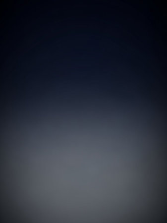 A dark gray to black gradient background with a subtle vignette effect, offering a minimalist and atmospheric backdrop for variousの素材