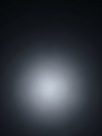 Center showing dark grey gradient background with a bright white circular spotlight effect in the center creating a dramatic and moody spotlight effect.の素材