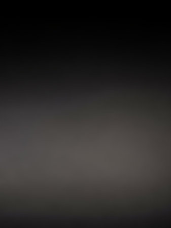 Simple showing smooth dark gray to black gradient background with subtle lighter gray transition at the bottom creating a soft atmospheric effect keywords:...の素材