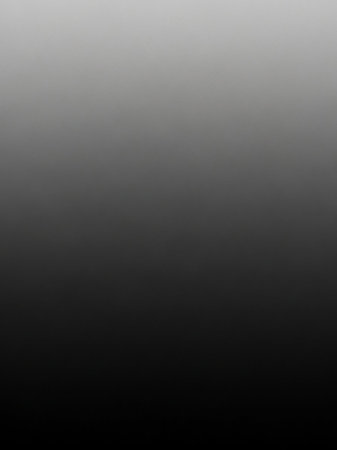 Simple showing smooth gradient transition from light gray to deep black creating a subtle and minimalist background effect for and presentation purposes keywords:...の素材