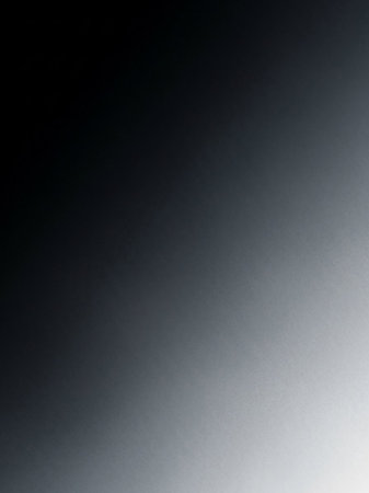 (1594) showing smooth gradient transition from deep charcoal gray to light silver gray with subtle grainy texture. resolution use.の素材