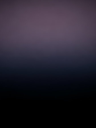 A smooth, dark gradient transitioning from deep black at the bottom to a soft, muted purple at the creating a subtle atmospheric effect.の素材