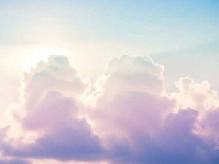 Stock showing soft pastel colored clouds illuminated by gentle sunlight creating a serene and dreamy sky with a hint of purple and pink hues keywords: clouds, sky,...の素材