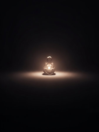 A small white figurine in a seated pose, emitting a soft glow from within, dramatically lit by a spotlight in a dark, atmospheric setting.の素材