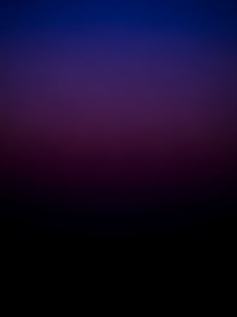 A smooth, deep vertical gradient transitions from rich indigo blue to dark plum purple and finally to solid black.の素材