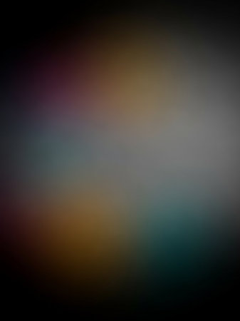 Orange showing softly blended gradient background featuring subtle hues of purple pink orange teal and gray with a dark vignette effect for a moody abstract...の素材