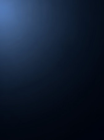 A smooth, deep blue gradient transitions from a lighter shade in the upper left to a darker tone, creating a subtle, atmospheric backdrop.の素材
