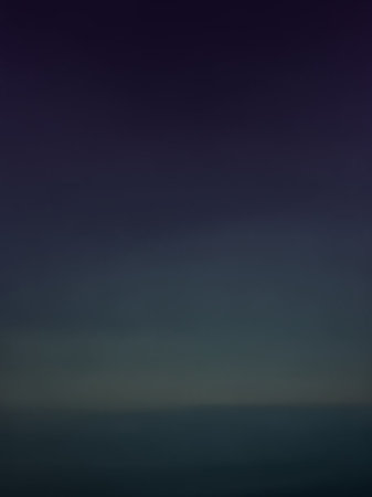 Muted showing deep twilight sky gradient transitioning from dark indigo to a muted teal horizon with a subtle, soft glow suggesting the end of day or beginning of...の素材