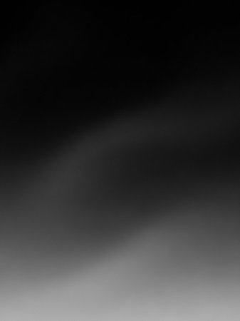 Stock showing monochromatic blurred background with soft grey tones and subtle light streaks creating a gentle and abstract visual for. resolutionの素材