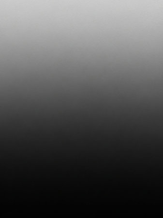 Projects showing smooth gradient transition from light gray to deep black with subtle texture visible across the entire frame creating a minimalist backdrop for...の素材