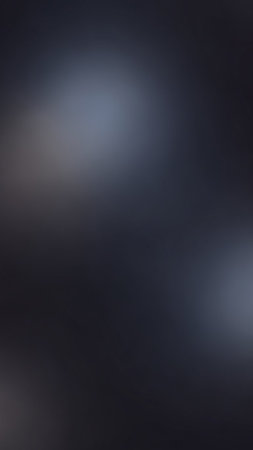 showing soft focus dark grey and blue gradient background with subtle light flares and smooth transitions creating a moody, atmospheric effect keywords:...の素材