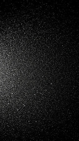 Covered showing a dark, textured background with a dense, fine scattering of tiny white specks resembling stars in a night sky or glitter particles keywords: dark...の素材