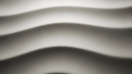Undulating showing abstract background with smooth undulating waves and soft shadows creating a sense of gentle movement and depth in muted grayscale tones...の素材