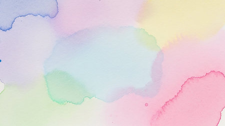 Soft watercolor paint washes in pastel shades of blue, green, yellow, pink, and purple blend together, creating a gentle and abstract background texture.の素材