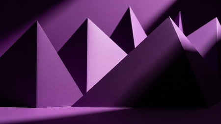 Geometric purple paper pyramids are arranged to create a minimalist abstract composition with strong shadows and highlights, forming a striking visual texture.の素材