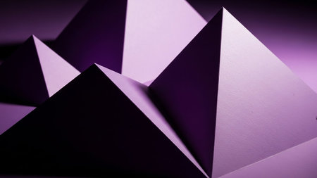 Abstract composition of folded paper pyramids in varying shades of purple and lavender, with sharp contrasts between light and shadow.の素材