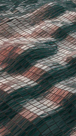 Deep showing wavy surface of interlocking square tiles in deep teal and copper tones reflecting light with a textured, mosaic appearance. resolutionの素材