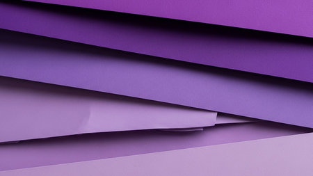 Diagonal showing stacked layers of paper in graduating shades of purple and lavender creating a textured background with subtle shadows and highlights keywords:...の素材