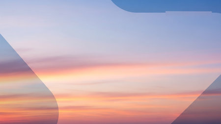 A soft pastel sunset sky with delicate wispy clouds is overlaid with abstract translucent white shapes creating a serene and ethereal background.の素材