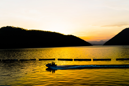 Sunset at Srinakarin dam in Kanchanaburi Thailandの写真素材