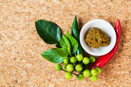 Thai green curry paste and vegetable prepare for cooking, top-view, Thailand