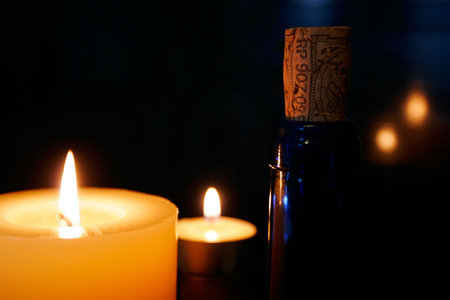 Candles and bottleの写真素材