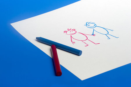 Figure of two people on a white sheetの写真素材