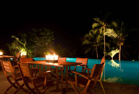 poolside candle light dinner at the resortの写真素材