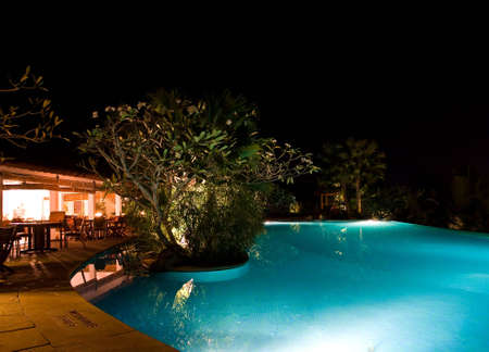 dinner by the pool sideの写真素材