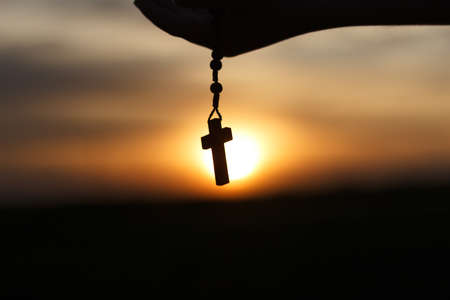 Black rosary at sunsetの写真素材