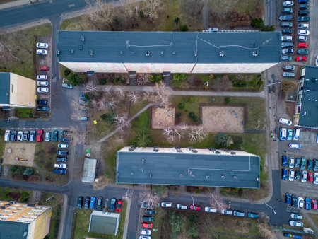 Aerial view of a parking lot with cars parked on it.の写真素材