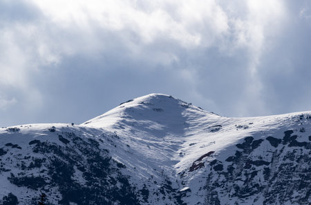 Mountain landscape with snow and blue sky. Caucasus Mountains, Georgia, region Gudauri.の写真素材