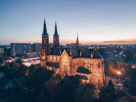 View at Pabianice city and Church of Our Lady of the Rosary from a drone at sunsetの写真素材